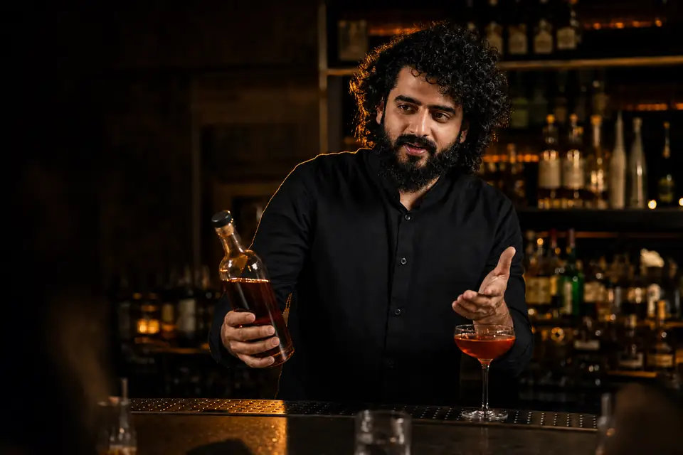 Mayur Marne presenting a spirit and cocktail